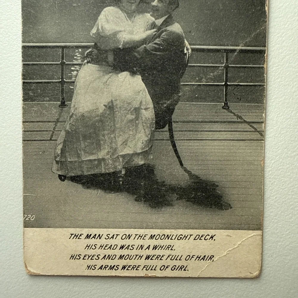 1912 Romance Postcard-Man Holding a Lady on His Lap on a Moonlight Ship's Deck